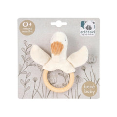 Soft plush duck rattle with a wooden ring, designed for babies aged 0+ months. Cream-colored with orange beak, ideal for sensory play.