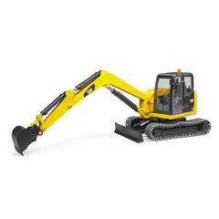 Yellow Bruder Cat Mini Excavator toy with tracked chassis, black bucket, and realistic cab design on white background.