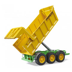 Yellow Joskin tipping trailer toy with green chassis and black wheels, showcasing lifting action.