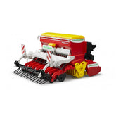 Bruder Pöttinger Vitasem 302ADD toy seeder in red, yellow, and white with realistic farm machinery details.