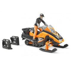 Orange snowmobile toy with driver in helmet, featuring dual-axle suspension, steering, and two black accessories beside it.