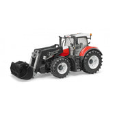 Red and black toy tractor with front loader, detailed cabin, large tires, scale 1:16, Bruder Steyr 6300 Terrus CVT model.