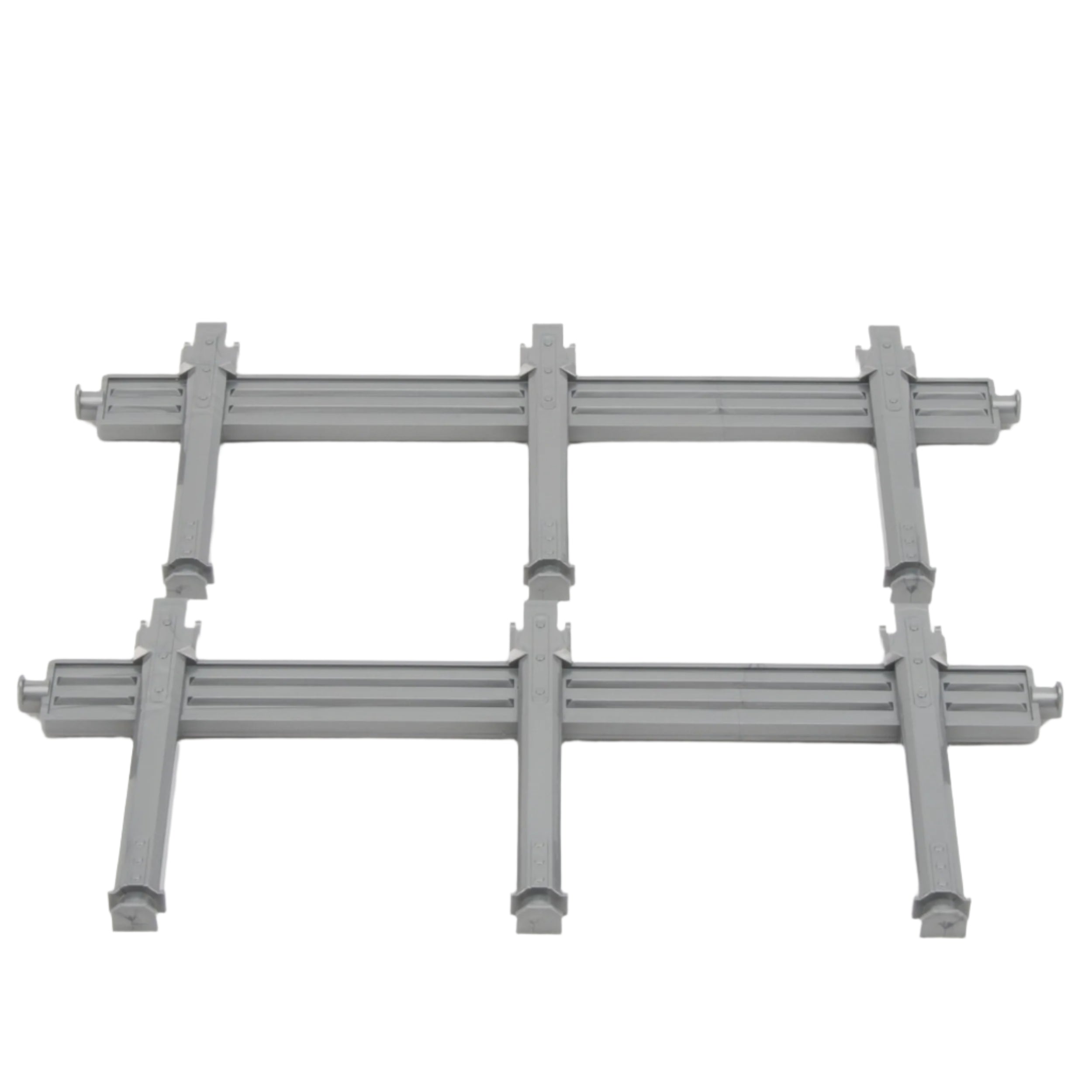 Gray plastic stanchions set for Bruder timber trailer, arranged in two rows on a white background.
