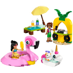 LEGO Friends Unicorn & Flamingo Pool Party set features colorful mini-dolls, a pink flamingo floatie, and a unicorn floatie with a cat. A table with drinks and a pineapple-themed DJ station adds to the festive scene.