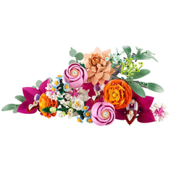 Colorful arrangement of LEGO® flowers, featuring pink roses, orange ranunculus, purple orchids, and green eucalyptus leaves, designed for crafting.