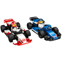 Two LEGO-built F1 race cars side by side, one in red and white for Haas with a driver minifigure, and one in blue for Williams with another driver. Each car has detailed wheels and a sleek design, perfect for imaginative play.