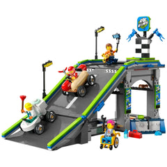 Lego City No Limits Race Car Ramp Track features a colorful construction set with a tall ramp, two quirky soapbox race cars, and playful minifigures.