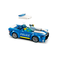 LEGO® City Police Car in vibrant blue, featuring sleek design, cool rims, and a police officer minifigure behind the wheel, with a removable roof piece.