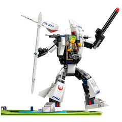 Black and white articulated mech suit with a minifigure pilot, holding a spear and a gun, set against a colorful base, from LEGO® City Robot World.