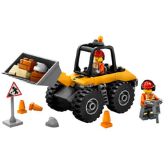 LEGO® City yellow Wheel Loader construction set with a driver minifigure at the controls and a worker minifigure with a toy jackhammer, surrounded by traffic cones and a roadwork sign.