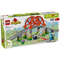 LEGO® DUPLO® Train Bridge and Tracks Expansion Set featuring an orange bridge, tracks, and a construction worker with tools.