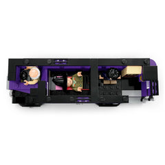 Detailed view of the LEGO® Harry Potter™ Knight Bus™, featuring three characters inside: a driver, a wizard, and a child. The vibrant purple and black interior includes beds and a small table, inviting imaginative play.
