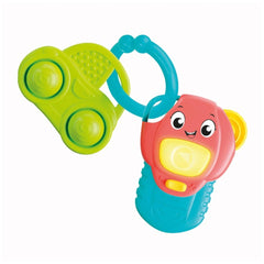 Baby Clementoni My First Activity Key toy features a smiling face with vibrant red, yellow, and green plastic design.