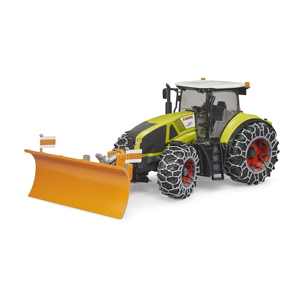 Claas Axion 950 toy tractor with snow chains and orange plough blade on display.