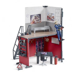 Bruder bworld Fire Station playset with firefighter figure sliding down a pole, control center, and firefighting gear.