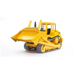 Yellow Bruder CAT bulldozer toy with adjustable blade and rubber tracks on a white background.