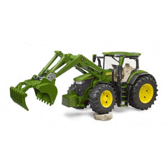 Green John Deere toy tractor with front loader, large black tires, and yellow rims on a white background.