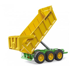 Yellow and green Bruder Joskin Tipping Trailer toy with realistic tipping action and three axles, designed for educational play.