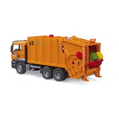 Orange toy garbage truck with black wheels, rear loading section open with yellow and green bins, Bruder logo visible.