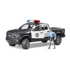 Black and white Bruder RAM 2500 police truck with red and blue lights, includes police officer figure.