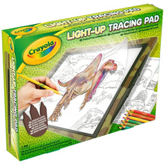 CRAYOLA Light-Up Tracing Pad packaging features a green design with a clear window, showcasing dinosaur-themed art supplies.