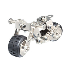 Eitech Motorcycle 1 construction set features a silver metal frame, black rubber wheels, and detailed components like pedals