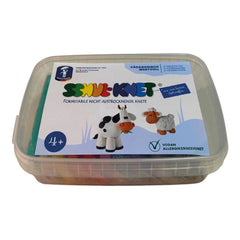 Feuchtmann Basic Modelling Dough in a transparent plastic container with colorful cow and sheep images on the label.