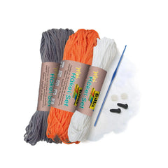 Folia Mini Crochet Kit features three skeins of gray, orange, and white yarn in a matte cardboard package with a vibrant labe
