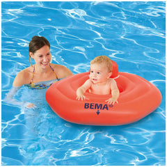 Happy People Bema Baby Swimming Seat with a baby in a red inflatable ring, smiling in clear blue water with a woman.