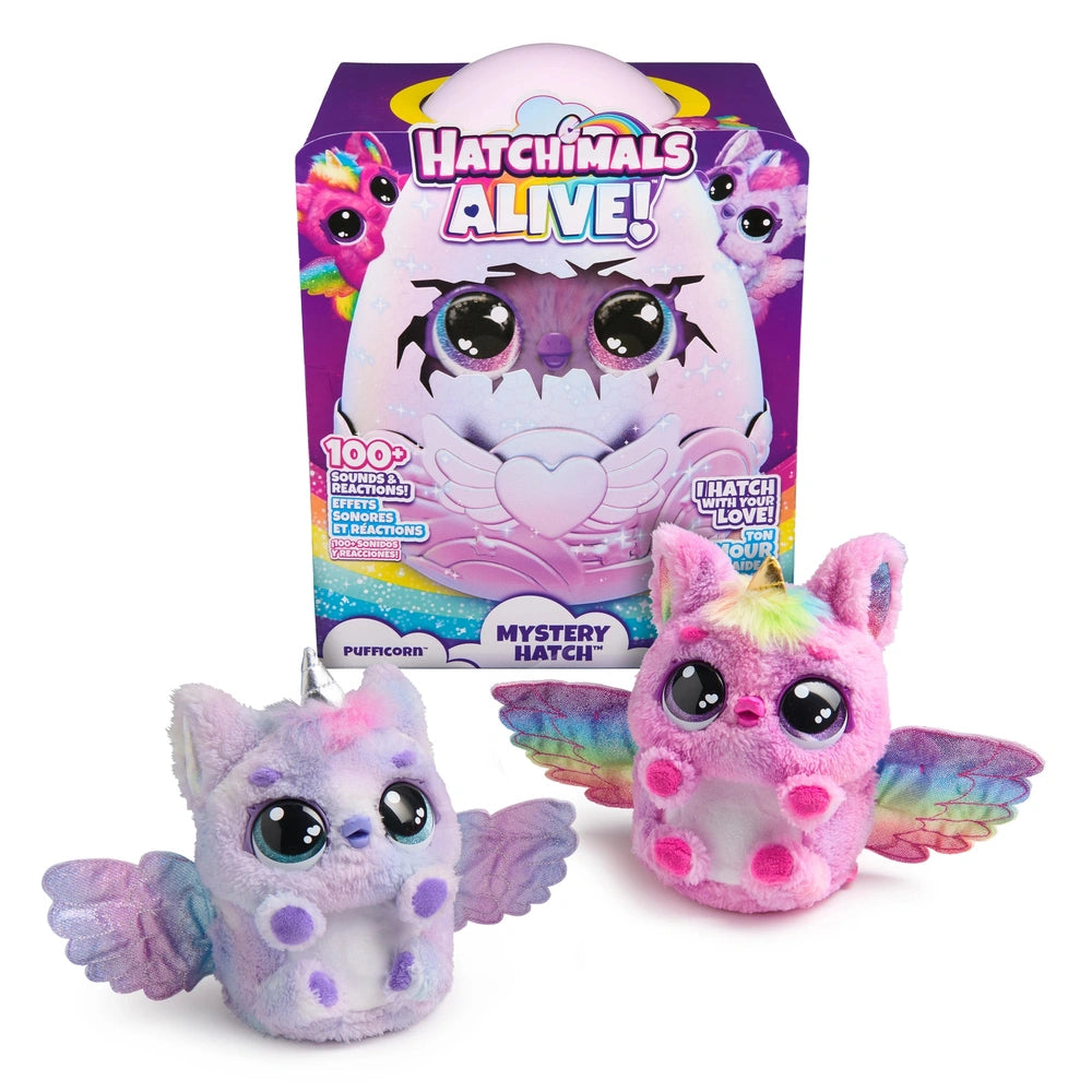 Hatchimals Alive Mystery Hatch Pufficorn is a soft, pink plush toy with wings, large eyes, and a heart design on its chest.