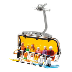 Jagerndorfer model features 6 figures sitting on orange seats with yellow and blue skiis and poles in a metal frame.