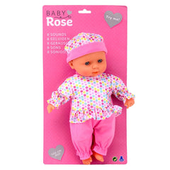Baby Rose 30 cm doll with light brown hair, floral outfit, and pink accessories in glossy retail packaging.