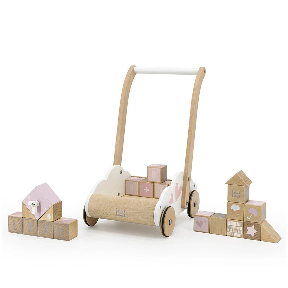 Wooden educational baby walker cart with white wheels, featuring pink and white blocks and a pink-roofed house.