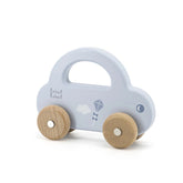 Little Car push and pull toy in white with blue roof, wooden wheels, kite design, and "label" text on the side.
