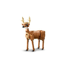 Posable LEGO Creator deer figure with brown and tan bricks, featuring antlers and a white underbelly, standing on four legs.