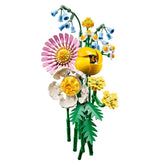 Colorful LEGO® Botanicals Petite Sunny Bouquet featuring six unique flowers, including pink gerbera, yellow yarrow, and bluebells, with green adjustable stems.