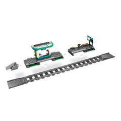 LEGO® City Downtown Streetcar and Station construction set featuring a vibrant station with a coffee shop, passenger platform, and track pieces.