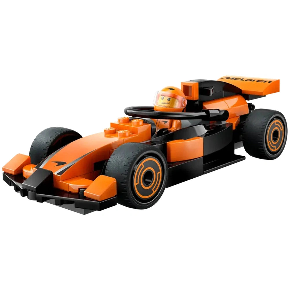 LEGO® City F1® Driver with McLaren Race Car set featuring an orange and black sleek race car, with a smiling driver minifigure in a helmet.