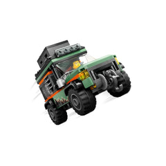 LEGO® City Off-Road Mountain Truck in vibrant green and orange, featuring rugged tires and a roof storage box, ready for adventure.