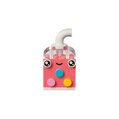 Bright pink LEGO® construction set piece resembling a cheerful drink cup, featuring large eyes and a smile, with colorful round accents.