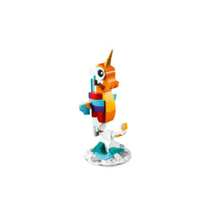 Colorful LEGO unicorn with a golden horn standing on a white circular base, featuring vibrant orange, blue, and purple blocks.
