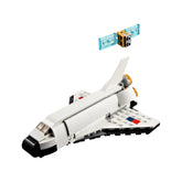 LEGO Creator 3in1 Space Shuttle in white with black accents, featuring an opening hatch revealing a detachable satellite above.