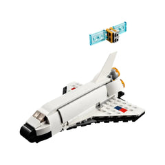 LEGO Creator 3in1 Space Shuttle in white with black accents, featuring an opening hatch revealing a detachable satellite above.