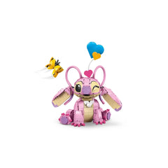 LEGO Angel building toy, a pink character with large ears and a wink, holds a blue and orange heart balloon, accompanied by a yellow butterfly.