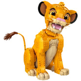 LEGO Disney Young Simba figure from The Lion King, vibrant orange with movable head, showcasing playful expression and detailed features.