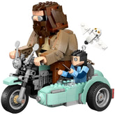 Hagrid and Harry Potter figures riding a blue motorcycle with a sidecar, featuring the owl Hedwig perched above.