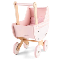 New Classic Toys pink doll pram features a wooden handle and polka dot cushions for pretend play and role playing.