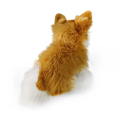 Eco-friendly plush Chihuahua toy in orange and white, showcasing a textured surface and fluffy tail against a light backgroun
