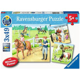 Ravensburger puzzle featuring a blue background, children in pink and blue shirts, and multiple brown, black, and white horse