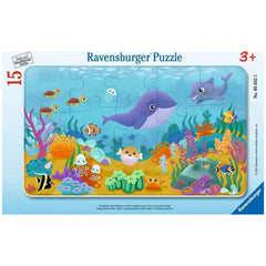 Ravensburger puzzle box featuring a colorful underwater scene illustration with various fish and marine life.
